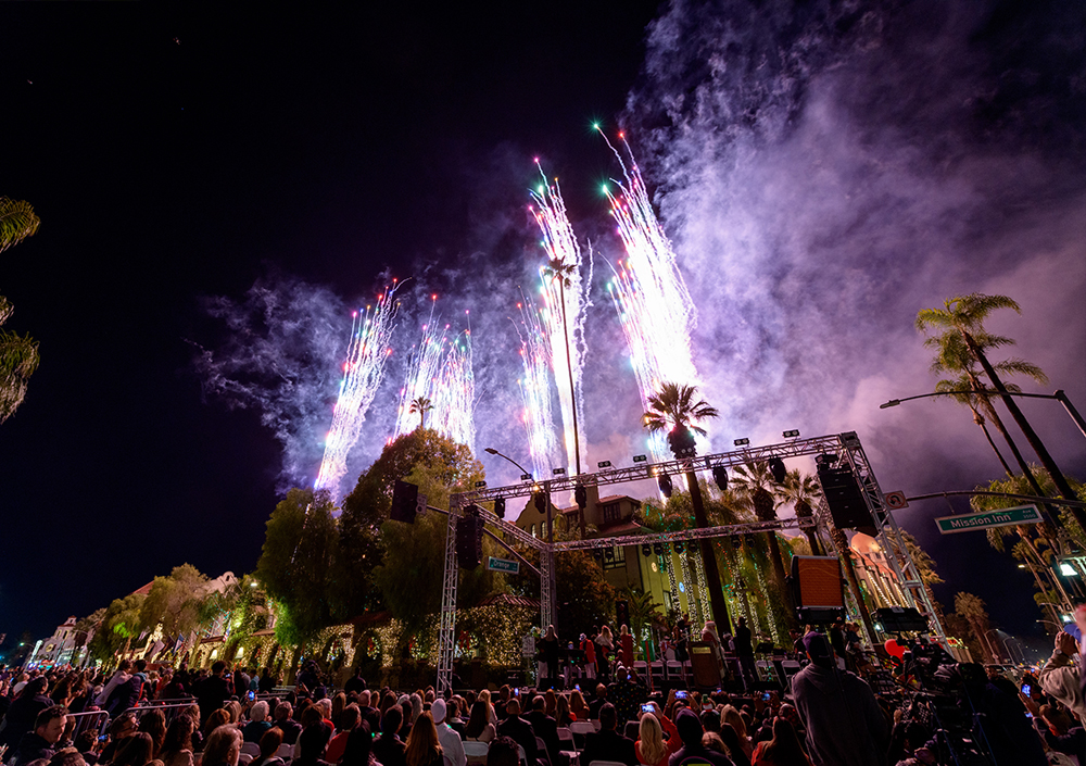 Fireworks above the crowd at Riverside Festival of Lights